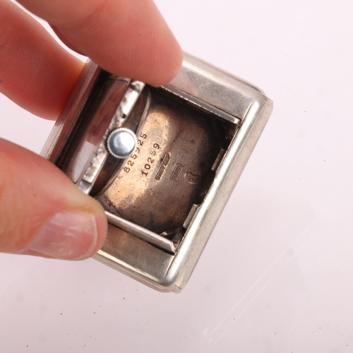 1052 - An Art Deco Swiss sterling silver mechanical purse watch, by Tavannes Watch Co, circa 1930, silvered... 