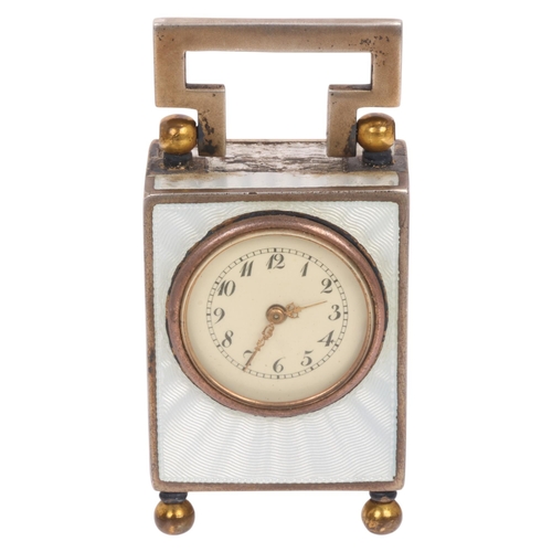 1062 - An Art Deco sterling silver-gilt white enamel miniature carriage clock, circa 1910, white dial with ... 