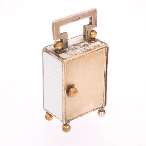 1062 - An Art Deco sterling silver-gilt white enamel miniature carriage clock, circa 1910, white dial with ... 