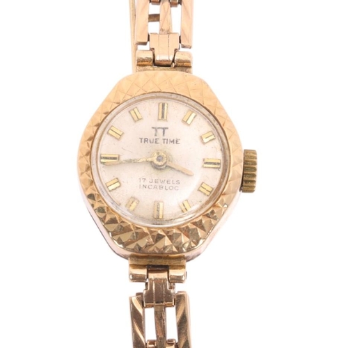 1082 - TRUE TIME - a lady's 9ct gold mechanical bracelet watch, circa 1960s, silver dial with gilt baton ho... 
