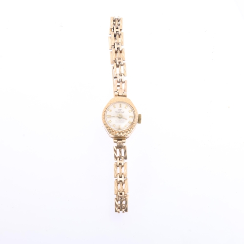 1082 - TRUE TIME - a lady's 9ct gold mechanical bracelet watch, circa 1960s, silver dial with gilt baton ho... 