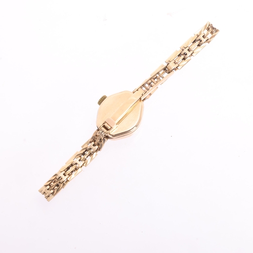 1082 - TRUE TIME - a lady's 9ct gold mechanical bracelet watch, circa 1960s, silver dial with gilt baton ho... 