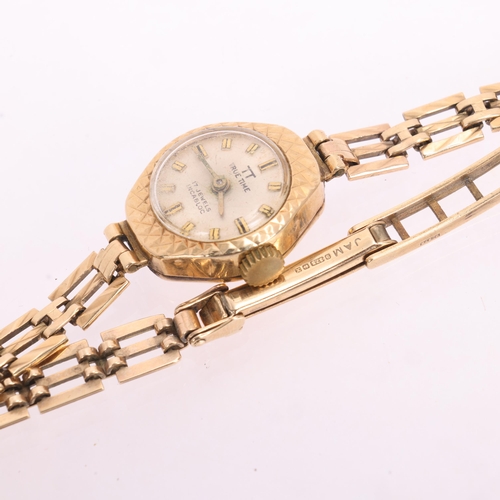 1082 - TRUE TIME - a lady's 9ct gold mechanical bracelet watch, circa 1960s, silver dial with gilt baton ho... 