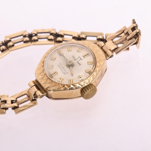 1082 - TRUE TIME - a lady's 9ct gold mechanical bracelet watch, circa 1960s, silver dial with gilt baton ho... 