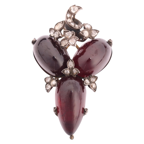 1101 - An Antique Victorian garnet and diamond pendant, circa 1860, set with 3 oval cabochon carbuncle foil... 