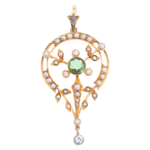 1106 - An Art Nouveau Edwardian 15ct gold green tourmaline diamond and split pearl openwork pendant, circa ... 