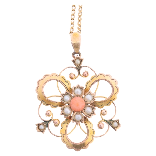 1111 - An Art Nouveau Edwardian 9ct gold coral and pearl openwork pendant necklace, on later 10k gold chain... 