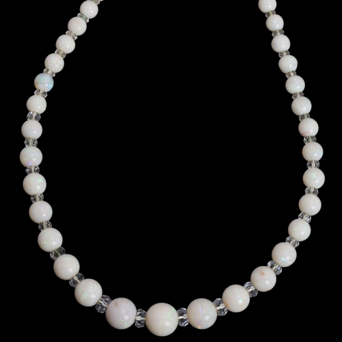 1114 - An Art Deco opal and paste collar necklace, set with graduated opal beads measuring from 12.6-4.6mm,... 