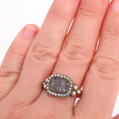 1119 - An Antique Georgian hairwork and pearl mourning ring, circa 1810, the rectangular compartment contai... 