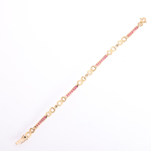 1120 - A heavy 9ct gold ruby and diamond line bracelet, channel set with calibre-cut rubies and modern roun... 