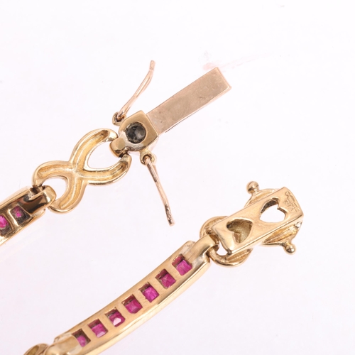 1120 - A heavy 9ct gold ruby and diamond line bracelet, channel set with calibre-cut rubies and modern roun... 