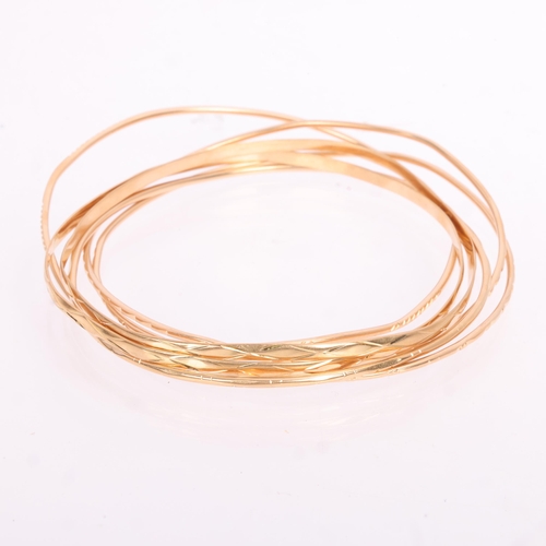 1124 - 6 Continental gold bangles, comprising 3 x 18ct gold, 12.4g, and 3 x 16ct gold, 10.6g (6)