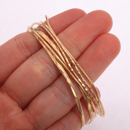1124 - 6 Continental gold bangles, comprising 3 x 18ct gold, 12.4g, and 3 x 16ct gold, 10.6g (6)
