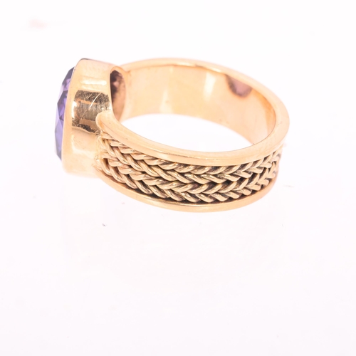 1125 - A Continental 18ct gold single stone synthetic sapphire dress ring, rub-over set with oval-cut synth... 
