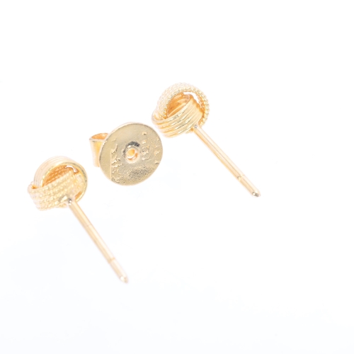 1128 - A pair of Continental 18ct gold knot stud earrings, with 1 original butterfly, 6.1mm, 2g