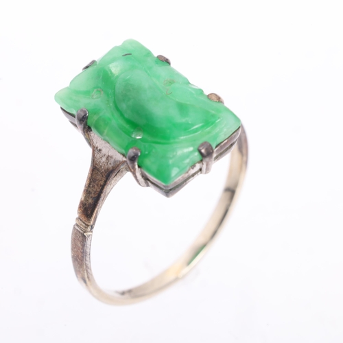 1203 - A Chinese 9ct gold jade panel ring, setting height 13.1mm, size K, 1.6g