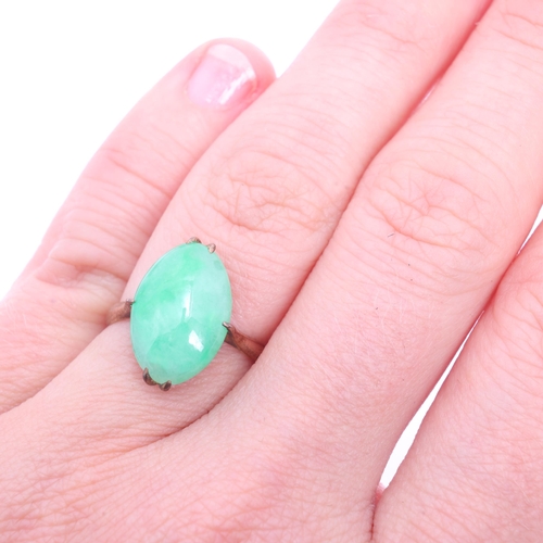 1205 - A Chinese 9ct gold jade panel ring, set with oval cabochon jade, jade measures approx 14.7 x 9.9 x 5... 