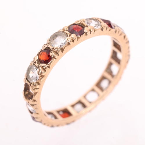 1207 - A Vintage 9ct gold garnet and white sapphire full eternity ring, band width 3.4mm, size K, 2.1g
