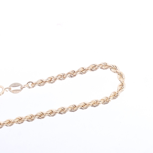 1214 - A 9ct gold rope twist chain bracelet, 17cm, 1.3g
