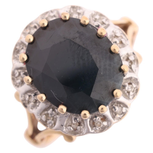 1216 - A 9ct gold sapphire and diamond cluster ring, claw set with oval mixed-cut sapphire and single-cut d... 