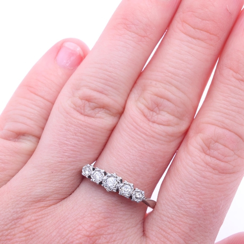 1219 - An 18ct gold five stone diamond ring, platinum-topped, illusion set with modern round brilliant-cut ... 