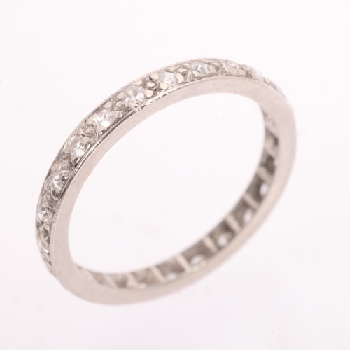 1222 - An Art Deco platinum diamond full eternity ring, set with single-cut diamonds, total diamond content... 