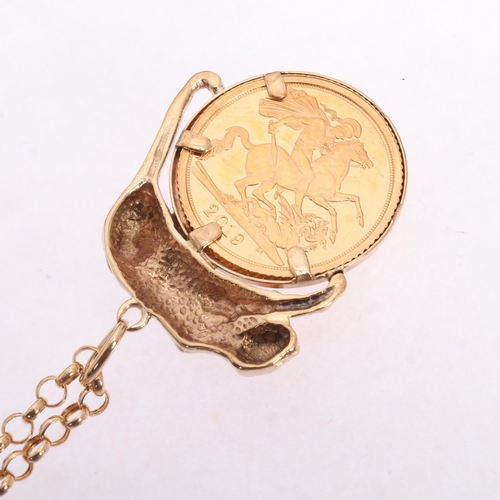 1225 - An Elizabeth II 2019 gold half sovereign coin, in 9ct gold panther pendant necklace mount, with 9ct ... 