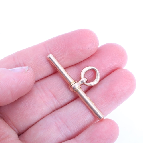 1226 - An Antique 15ct rose gold T-bar, maker JG&S, 38.7mm, with 15ct solid curb link jump ring, 5.7g