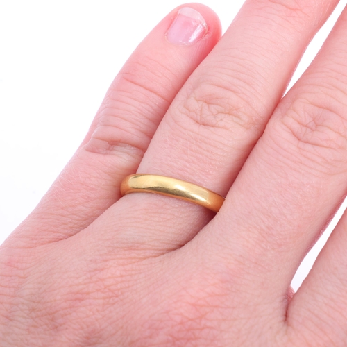 1228 - A 22ct gold wedding band ring, probably Charles Green & Son Ltd, Birmingham 1928, setting height 3.3... 