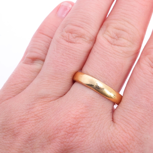 1229 - A 22ct gold wedding band ring, indistinct maker, London 1918, band width 4.4mm, size O, 8.5g