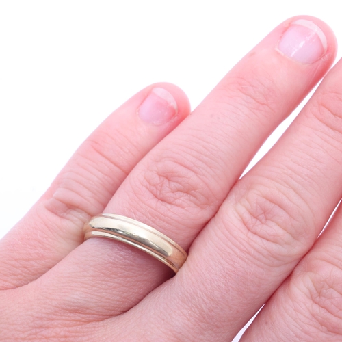 1230 - A 9ct gold wedding band ring, setting height 4.7mm, size P, 2.3g