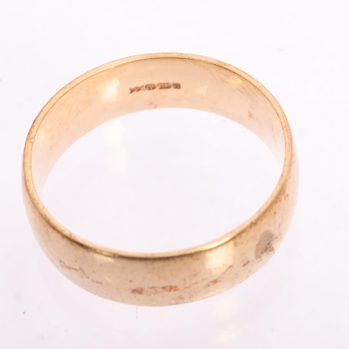 1236 - A 9ct gold wedding band ring, setting height 6mm, size Q, 4.7g