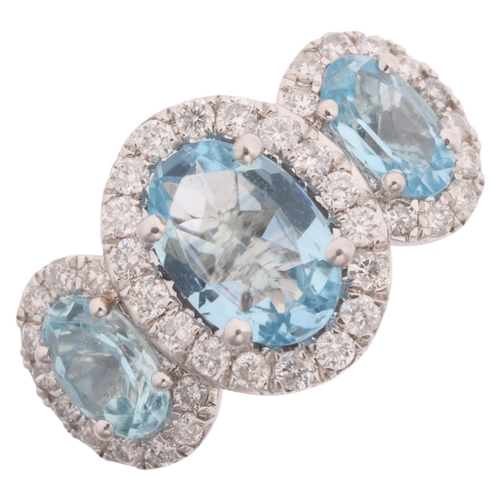 1241 - A 9ct white gold aquamarine and diamond triple cluster ring, set with oval mixed-cut aquamarines and... 