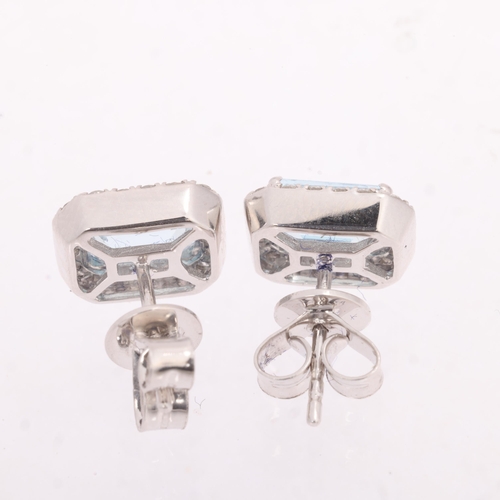 1242 - A pair of 18ct white gold aquamarine and diamond cluster stud earrings, set with octagonal step-cut ... 