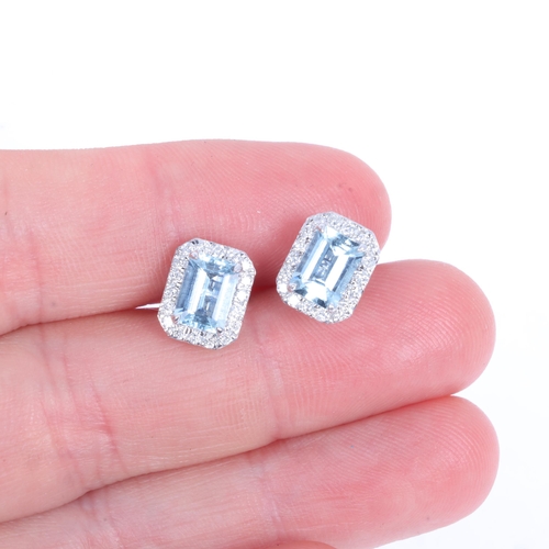 1242 - A pair of 18ct white gold aquamarine and diamond cluster stud earrings, set with octagonal step-cut ... 