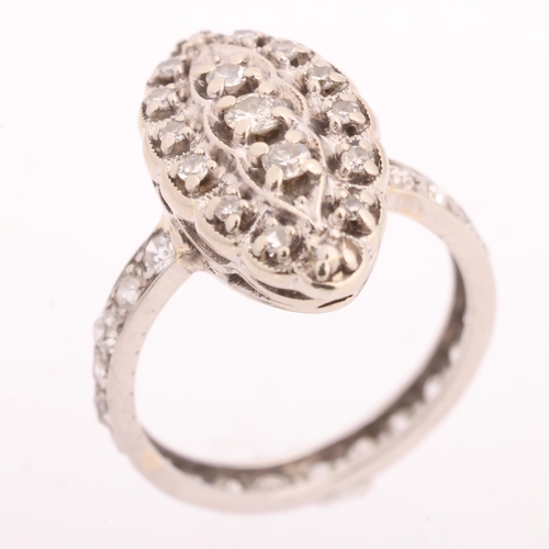 1246 - A diamond marquise cluster ring, set with modern round brilliant-cut diamonds and single-cut diamond... 