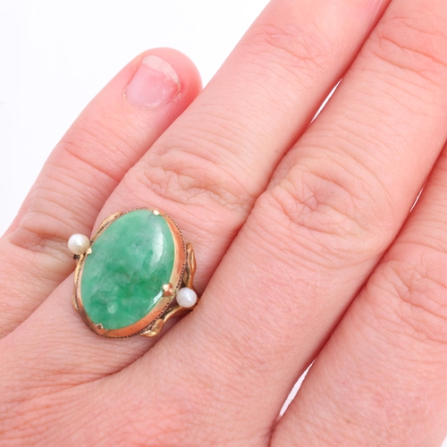 1250 - A Chinese 18ct gold jade and pearl dress ring, set with oval low cabochon jade, jade measures approx... 