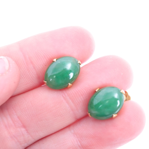 1253 - A pair of Chinese 14ct gold jade earrings, maker TH, set with oval cabochon jade, jade measures appr... 