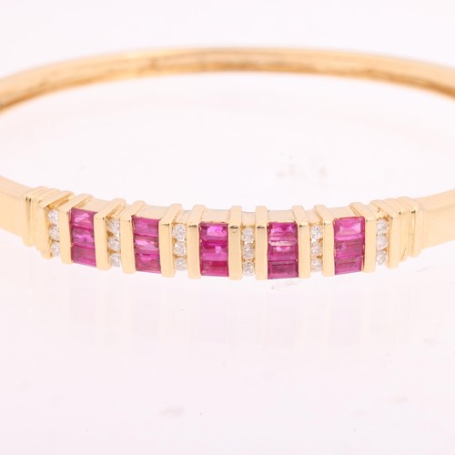 1133 - A 14ct gold ruby and diamond half hoop hinged bangle, bar set with rectangular step-cut rubies and m... 