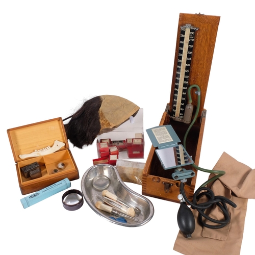 A Vintage boxed blood pressure machine, 2 glass eyes, partial jaw bone ...