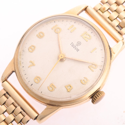 1005 - TUDOR - a Vintage 9ct gold mechanical bracelet watch, ref. 12856, circa 1950s, silvered dial with gi... 