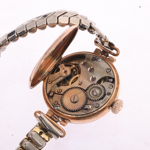 1015 - A 9ct rose gold Officer's style trench mechanical wristwatch, silvered dial with black Arabic numera... 