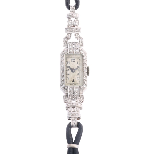 1024 - An Art Deco lady's platinum diamond mechanical cocktail wristwatch, circa 1940s, silvered dial with ... 