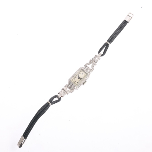 1024 - An Art Deco lady's platinum diamond mechanical cocktail wristwatch, circa 1940s, silvered dial with ... 
