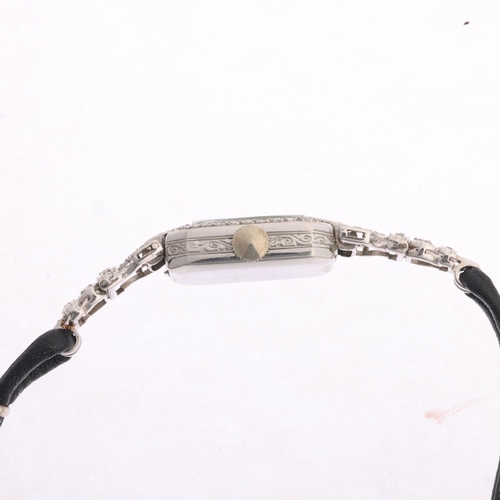 1024 - An Art Deco lady's platinum diamond mechanical cocktail wristwatch, circa 1940s, silvered dial with ... 