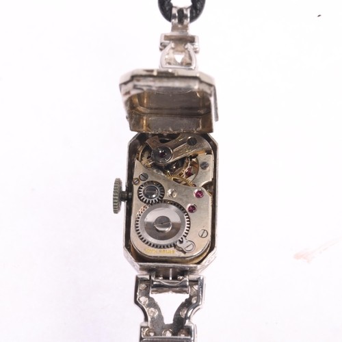 1024 - An Art Deco lady's platinum diamond mechanical cocktail wristwatch, circa 1940s, silvered dial with ... 