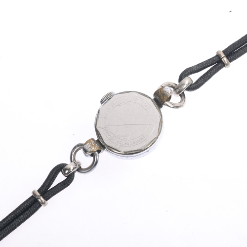 1025 - BUCHERER - a lady's Vintage stainless steel mechanical wristwatch, circa 1960s, silvered dial with b... 