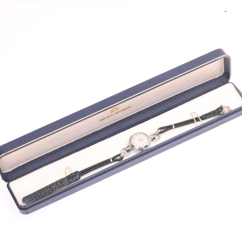 1025 - BUCHERER - a lady's Vintage stainless steel mechanical wristwatch, circa 1960s, silvered dial with b... 