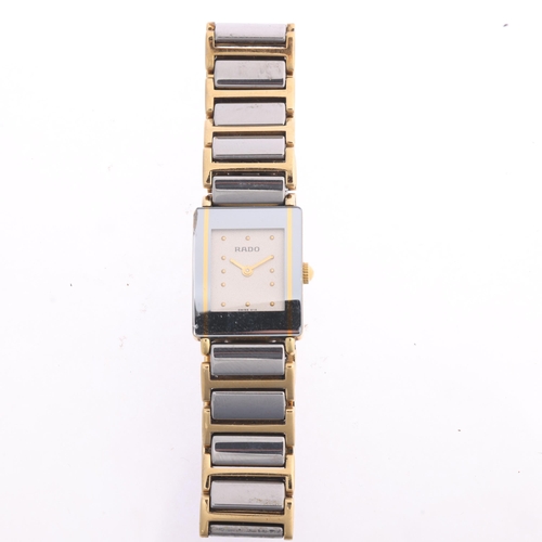 1033 - RADO - a lady's gold plated ceramic Diastar quartz bracelet watch, ref. 153.0383.3, silvered dial wi... 