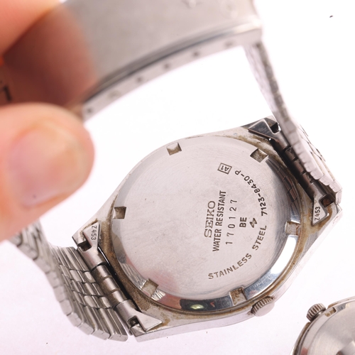 1056 - SEIKO - a pair of 'His And Hers' stainless steel SQ quartz calendar bracelet watches, ref. 7123-8430... 